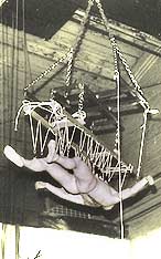 Paul is zoomed up and down, back and forth, and rotated by Vaughn inside a huge warehouse space.  I felt “electric” rain falling from his suspended body.