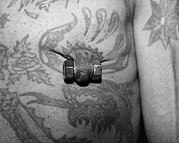 Alan Oversby's stretched nipple piercing (Mr. Sebastian).